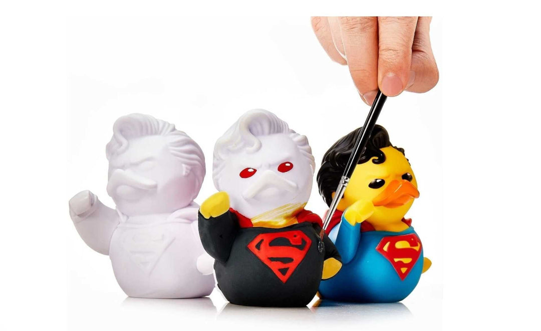 Painting a blank duck figurine as Superman